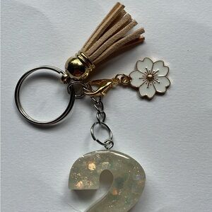 Elegant Beige Tassel Keychain with Floral Charm